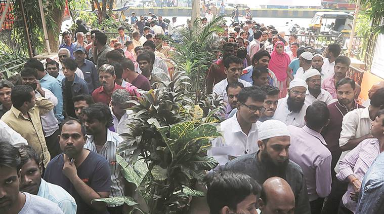 A long queue in front the Bank ATM at Santacruz for exchanging currency notes. (Express Photo by Pradip Das)