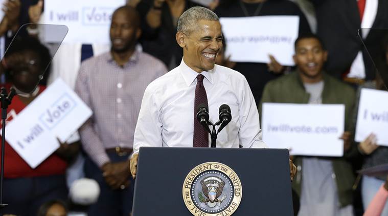 President Barack Obama smiles at the crowd while campaigning for Democratic presidential candidate Hillary Clinton, Friday, Nov. 4, 2016, at Fayetteville State University in Fayetteville, N.C. (AP Photo/Gerry Broome)