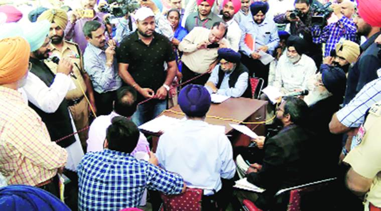 Congress MLA Kuljit Nagra (left, with mike) during the sangat darshan. Express Photo