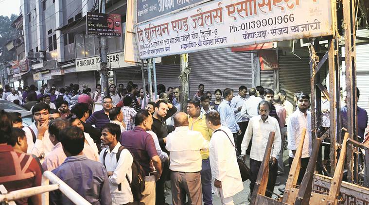 Shopkeepers at Delhi’s Chandni Chowk, where searches were conducted, Thursday. Express Photo by Amit Mehra 