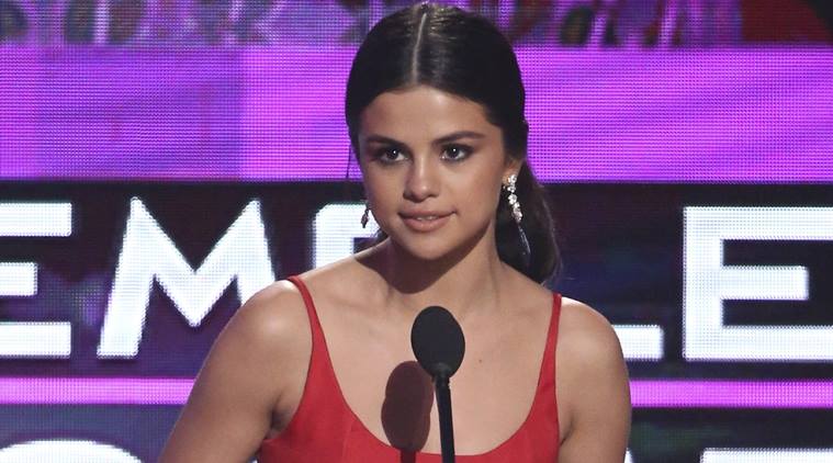 Selena Gomez accept the award favorite female artist pop/rock at the American Music Awards at the Microsoft Theater on Sunday, Nov. 20, 2016, in Los Angeles. (Photo by Matt Sayles/Invision/AP)