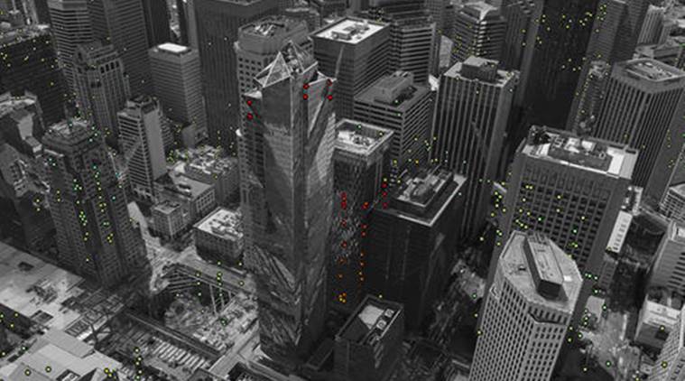 The image provided by the European Space Agency ESA on Thursday, Nov. 24, 2016, shows the Millennium Tower in San Francisco on the base of modified Copernicus Sentinel satellite data. The European Space Agency has released satellite data that shows the skyscraper in San Francisco's financial district continuing to sink at a steady rate, and perhaps faster than previously known. The colored dots represent targets observed by the radar. The colour scale ranges from 40 mm a year away from radar (red) to 40 mm a year towards radar (blue). Green represents stable targets. (ESA SEOM INSARAP study/ESA via AP)