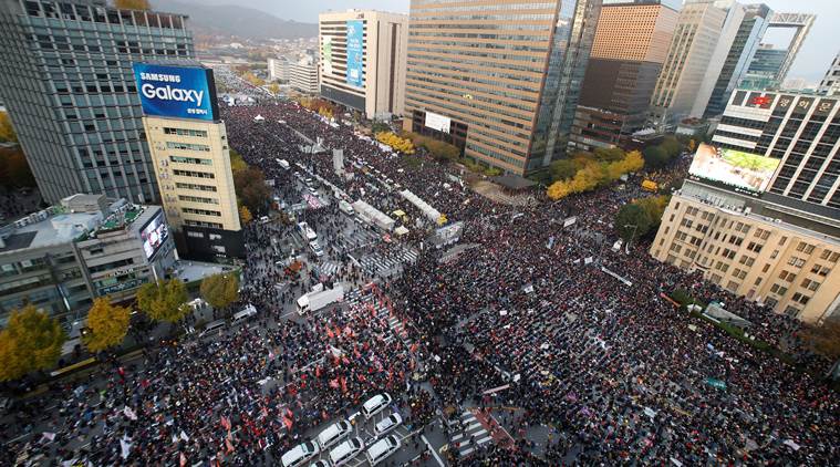 People take part in a rally calling for President Park Geun-hye to step down in central Seoul, South Korea, November 12, 2016. REUTERS/Kim Hong-Ji