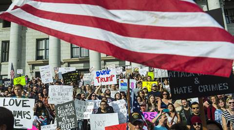 Thousands of US millennials carry protests against Donald Trump into second week