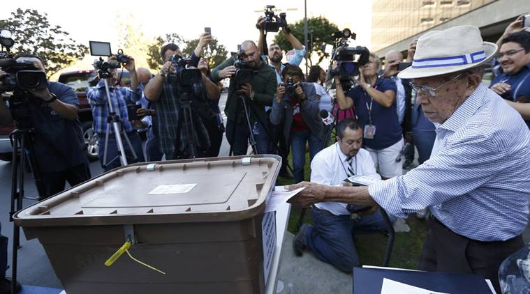 Fabio Alvarado, 91, originally from El Salvador and who was sworn in as a U.S. citizen on election day, casts his ballot during the U.S. presidential election at LA County Registrar Office in Norwalk, California, U.S., November 8, 2016. REUTERS/Mario Anzuoni