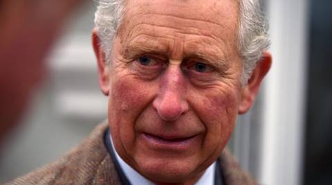 Britain's Prince Charles visits with people whose homes were flooded by the recent Storm Desmond, in Carlisle, England, Monday, Dec. 21, 2015. (Alan Davidson/Pool Photo via AP)