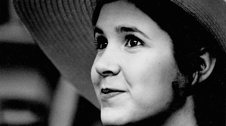 FILE - This May 2, 1973 file photo shows Carrie Fisher, the 16-year-old daughter of Debbie Reynolds and Eddie Fisher, in New York. On Tuesday, Dec. 27, 2016, a publicist says Carrie Fisher has died at the age of 60. (AP Photo/Jerry Mosey, File)