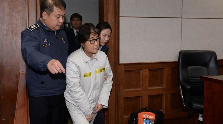 Choi Soon-sil, a long-time friend of South Korean President Park Geun-hye who is at the center of the South Korean political scandal involving Park, arrives for her first court hearing in Seoul, South Korea, December 19, 2016. Korea Pool/via REUTERS ATTENTION EDITORS - THIS IMAGE HAS BEEN SUPPLIED BY A THIRD PARTY. SOUTH KOREA OUT. TPX IMAGES OF THE DAY
