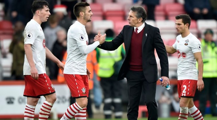 Southampton's Sofiane Boufal and manager Claude Puel celebrate after the game