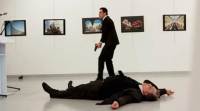 Russian Ambassador to Turkey Andrei Karlov lies on the ground after he was shot by Mevlut Mert Altintas at an art gallery in Ankara Russian ambassador, Mevlut Altintas, Mevlut Altintas shooter, russian ambassador killed, Tayyip Erdogan, Erdogan, coup, turkey coup, turkey failed coup, putin, syria putin, aleppo, IS, jihadist, syria, islamic state, Andrei Karlov, Andrei Karlov turkey, Andrei Karlov shooter, Russian ambassador shooter, Russian ambassador killed, Russia ambassador assassination, Russia-Turkey, Russian ambassador killed in Turkey, latest news, latest world news