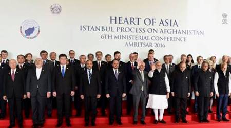 Amritsar: Prime Minister Narendra Modi, along with Afghanistans President Ashraf Ghani, Finance Minister Arun Jaitley, MoS for External Affairs V K Singh and other delegates, poses for a group photo before the inauguration of the 6th Heart of Asia Ministerial Conference, in Amritsar on Sunday. PTI Photo by Kamal Kishore(PTI12_4_2016_000022B)