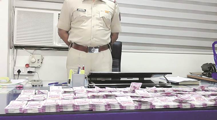 money seized in juhu, new currency notes seized in juhu, money seized mumbai, mumbai news, indian express