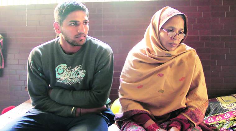 Nitin Saini with his mother Dhanvanti. (Source: Express photo by Gavendra Yadav)