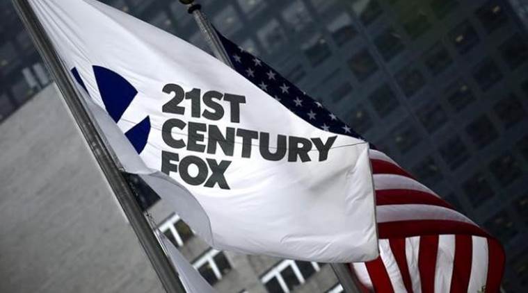 The flag of the Twenty-First Century Fox Inc is seen waving at the company headquarters in the Manhattan borough in New York June 11, 2015. REUTERS/Eduardo Munoz/File Photo