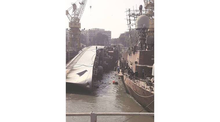 INS Betwa tipped over and hit the ground while being undocked at the Naval Dockyard in Mumbai Monday. Express photo