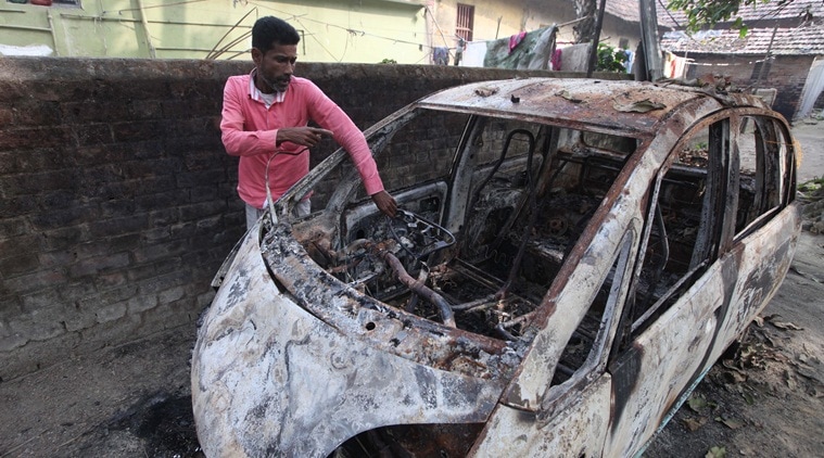 Shabir Mallik at shows his burn Nano car at Baisar para Express Photo by Partha Paul.28.12.16.Howrah