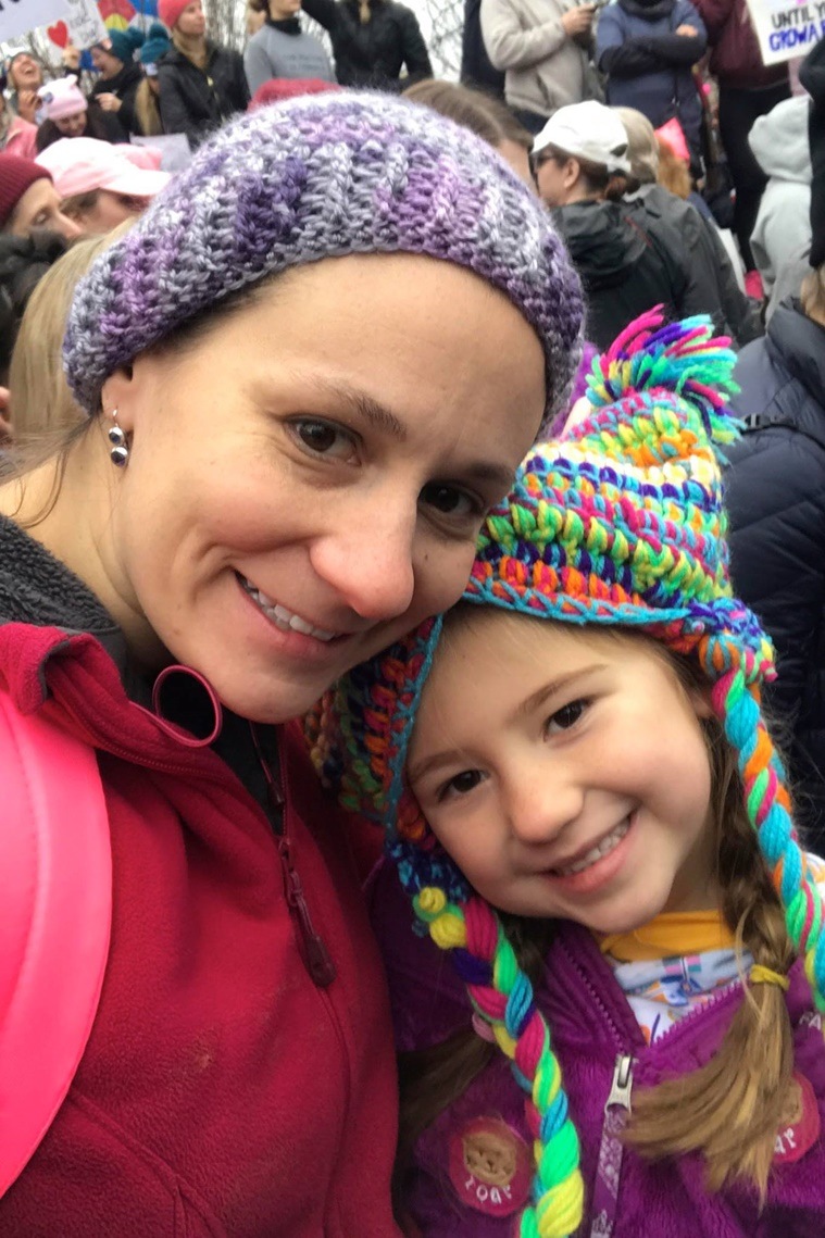 Heather Kennedy with her daughter Caitlin at the march in Baltimore.