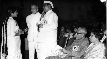 Playback singer Lata Mangeshkar greets Goa Chief Minister Dayanand Bandodkar and Maharastra Revenue Minister DS Desai looking on are Maharastra Chief Minister VP Naik Lata's father stage stalwart Master Deenanath Mangeshkar hailed from Goa . Express archive photo on 21.04.1967