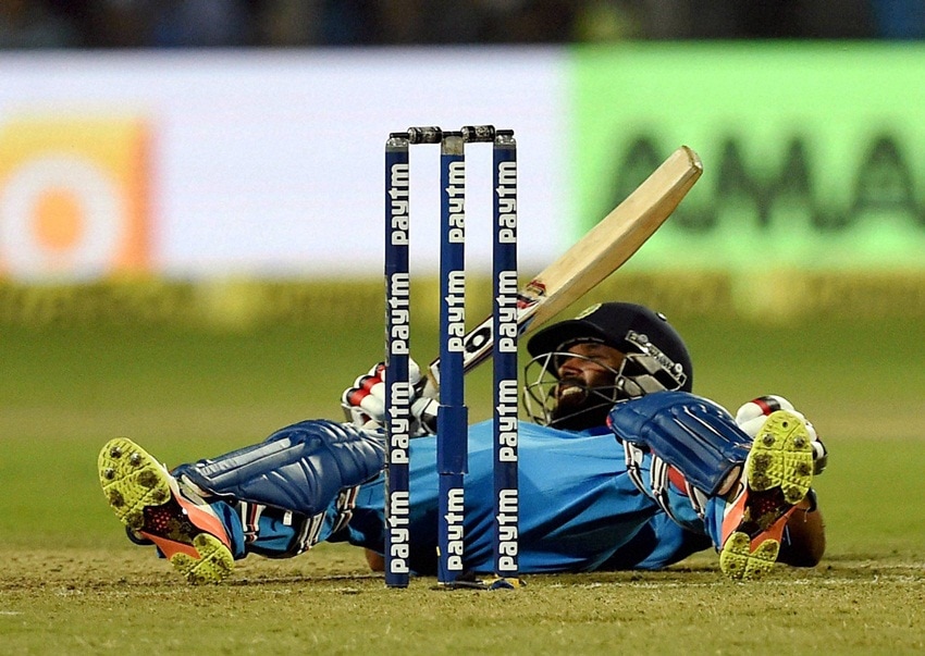 virat kohli, kohli 100, kedar jadhav, jadhav 100, india vs england, ind vs eng photos, ind vs eng pics, india vs england first odi images, ind vs eng first odi, ind vs eng odi series, india vs england first odi win, captain kohli, ms dhoni, cricket news, sports news