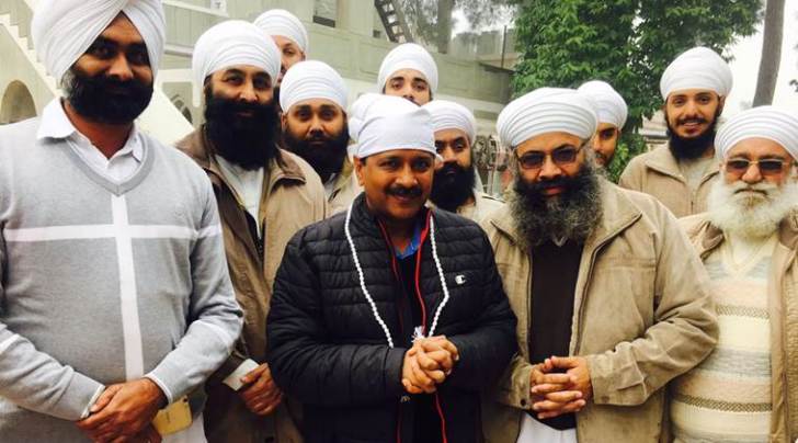 Arvind Kejriwal with members of the sect