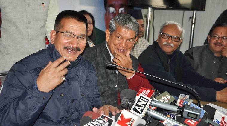 Dehradun: Uttarakhand Congress chief Kishore Upadhyay along with the state CM Harish Rawat during a press conference at party headquarters in Dehradun on Tuesday. PTI Photo(PTI1_17_2017_000168B) *** Local Caption ***