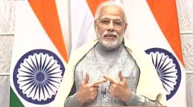 narendra modi, modi, pm modi, KVIC row, ahmed patel, KVIC calendar, mahatma gandhi, modi on KVIC calendar, indian express, india news