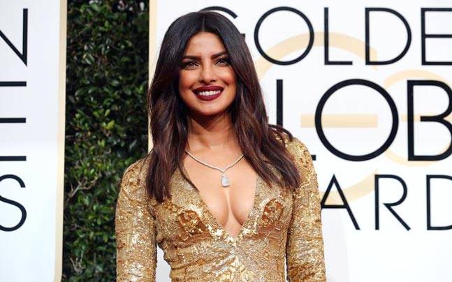 647px x 404px - Priyanka Chopra's gold avatar at the Golden Globe Awards gets a split  reaction | Lifestyle News,The Indian Express