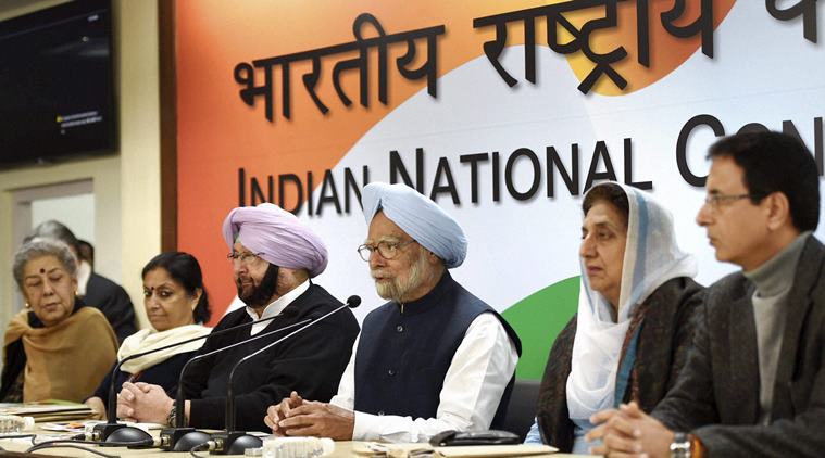 New Delhi: Former Prime Minister Manmohan Singh with Punjab Congress president Capt Amrinder Singh and other leaders addresses the media after the release of the party manifesto for the assembly elections in Punjab, at AICC Headquaters in New Delhi on Monday. PTI Photo by Kamal Singh     (PTI1_9_2017_000075B)