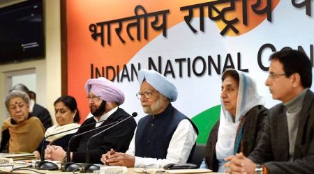 New Delhi: Former Prime Minister Manmohan Singh with Punjab Congress president Capt Amrinder Singh and other leaders addresses the media after the release of the party manifesto for the assembly elections in Punjab, at AICC Headquaters in New Delhi on Monday. PTI Photo by Kamal Singh     (PTI1_9_2017_000075B)