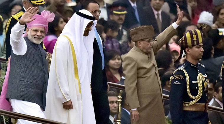 New Delhi: President Pranab Mukherjee, Prime Minister Narendra Modi wave to the crowd as General Sheikh Mohammed Bin Zayed Al Nahyan, Crown Prince of Adu Dhabi looks on as they leave after attending the 68th Republic Day celebrations at Rajpath in New Delhi on Thursday. PTI Photo by Kamal Kishore (PTI1_26_2017_000008A)