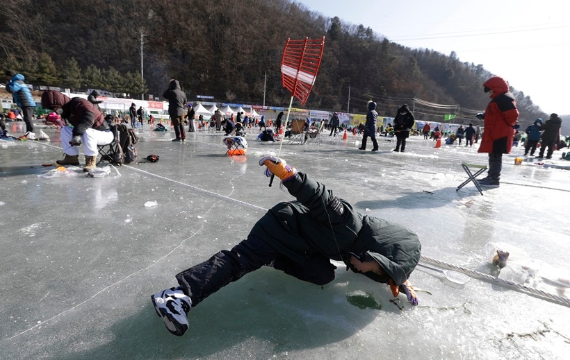 south korea, winter, winter festival, ice festival, ice fishing festival, unique winter festivals, South Korea Ice Fishing Festival, Hwacheon Sancheoneo Ice Festival, 2017 Hwacheon Sancheoneo Ice Festival, 2017 south korea fishing festival, lifestyle news, world news, latest news, indian express