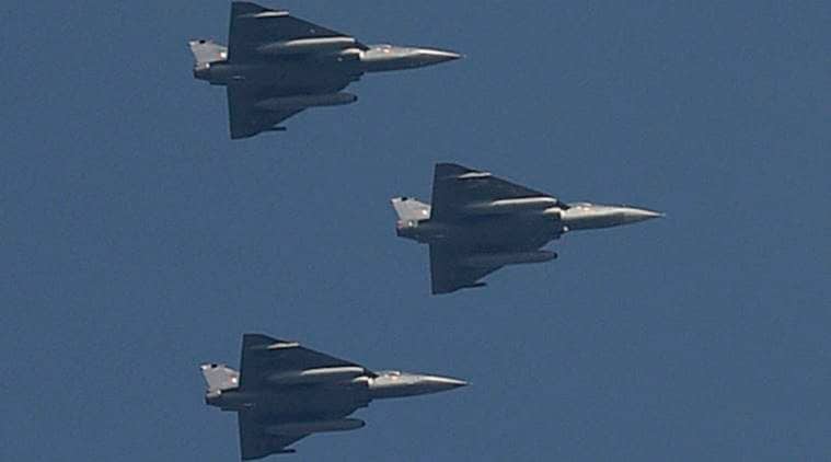 New Delhi: Indian Air Force's Tejas planes flying past for the first time during a full dress rehearsal for the Republic Day Parade at Rajpath in New Delhi on Monday. PTI Photo by Kamal Singh (PTI1_23_2017_000128B)