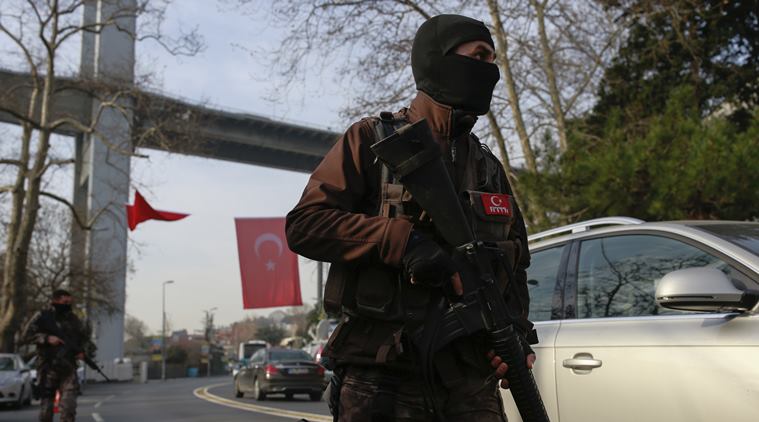 Turkish special security force members patrol near the scene of the Reina night club following the New Year's day attack, in Istanbul, Wednesday, Jan. 4, 2017. Turkey has identified the gunman in the Istanbul nightclub massacre, the foreign minister said Wednesday as the president vowed that the country won't surrender to terrorists or become divided. (AP Photo/Emrah Gurel)