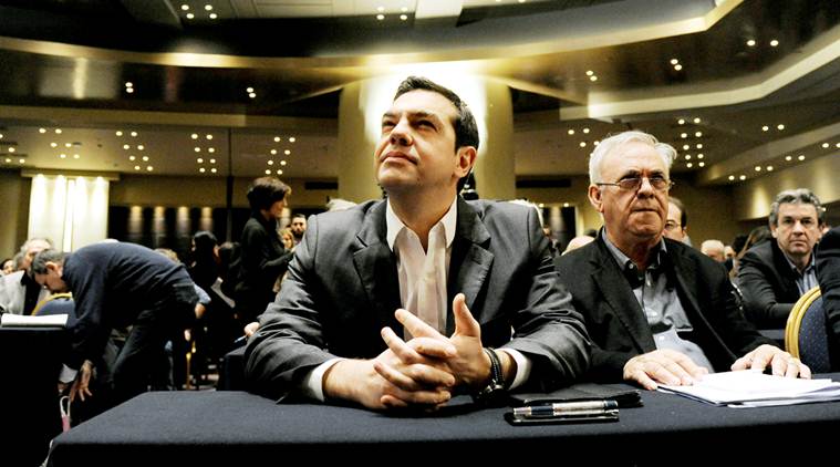 Greek Prime Minister Alexis Tsipras sits next to Deputy Prime Minister Giannis Dragasakis (R) before his speech at the ruling Syriza party central committee in Athens, Greece, February 11, 2017. REUTERS/Michalis Karagiannis     TPX IMAGES OF THE DAY
