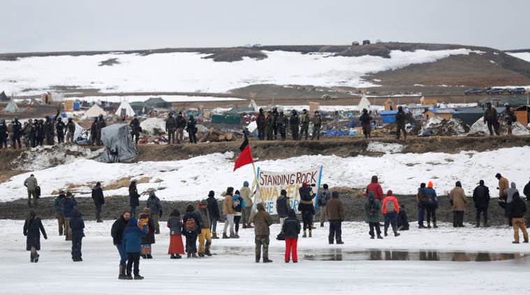 Protesters confront police on the outskirts of the main opposition camp against the Dakota Access oil pipeline near Cannon Ball, North Dakota, U.S., February 23, 2017. REUTERS/Terray Sylvester