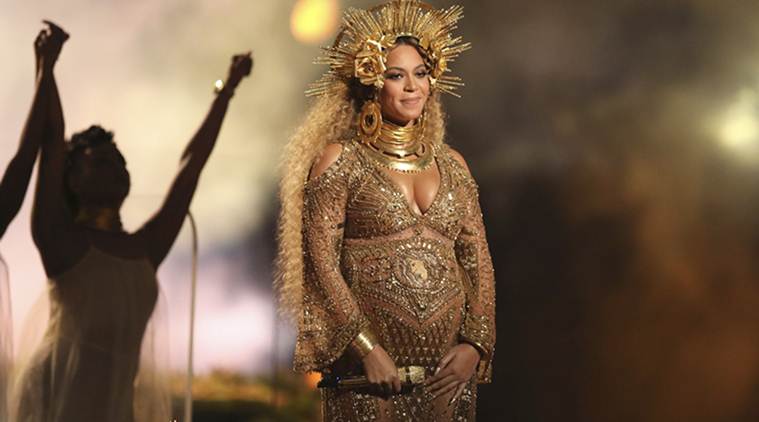 beyonce gold dress grammys Beyonce Spreads Her Golden Glow In A Gilded Gown With Paisley And Pearl  Details