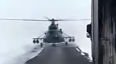 Helicopter lands on road, helicopter lands on highway, chopper lands on highway, pilot lands on the road, pilot lands on highway, trainee pilot lands on highway, indian express, indian express news