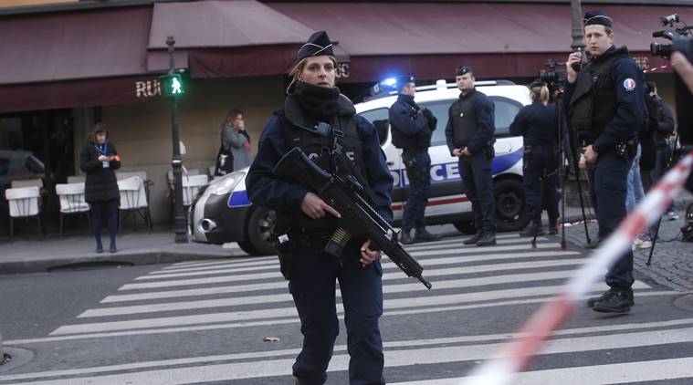 Police officers take position outside the Louvre museum in Paris,Friday, Feb. 3, 2017. Paris police say a soldier has opened fire outside the Louvre Museum after he was attacked by someone, and the area is being evacuated. (AP Photo/Thibault Camus)