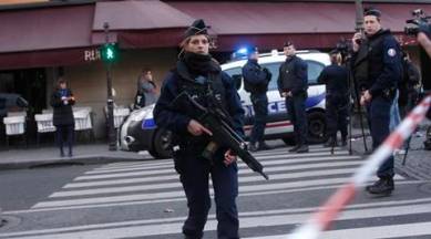 Police officers take position outside the Louvre museum in Paris,Friday, Feb. 3, 2017. Paris police say a soldier has opened fire outside the Louvre Museum after he was attacked by someone, and the area is being evacuated. (AP Photo/Thibault Camus)