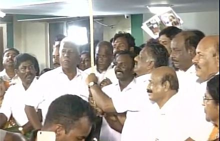 Supporters including transgenders felicitate O Panneerselvam at his residence after SC's DA case verdict that convicted Sasikala. 