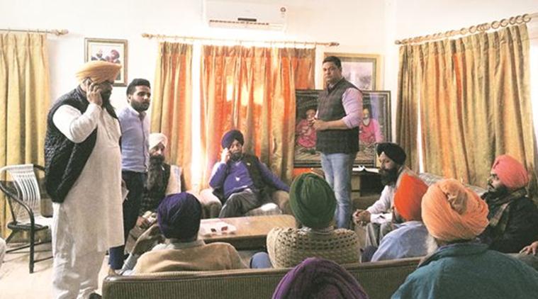 Bhatti, seated on the sofa, fielding yet another call. Kanchan Vasdev