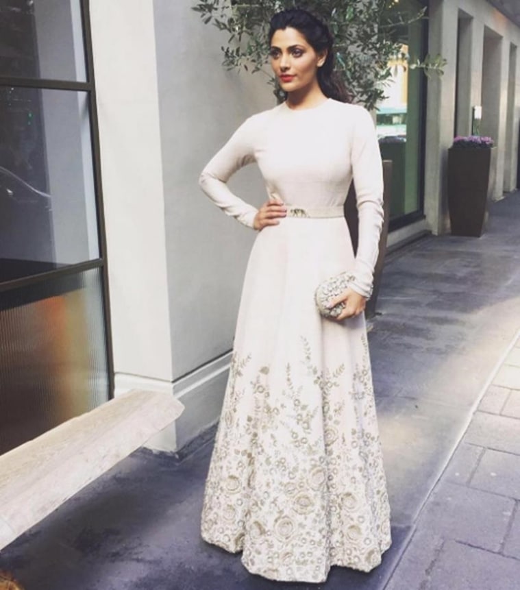 At Mirziya's promotion in London, Saiyami Kher was seen in a beautiful floor length ivory gown by Sabyasachi which was beautifully embellished with zardozi embroidery at the bottom. A pop of red lip shade rounded out the look, She looked lovely.