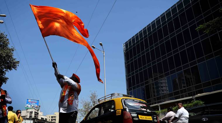 Shiv Sainiks celebrating in front of Sena Bhavan in Dadar on Thursday. Express photo by Nirmal Harindran