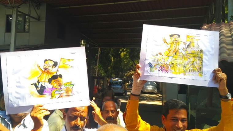 Caricatures of Uddhav Thackeray outside his residence in Bandra East, Mumbai. Express Photo/Amit Chakravarty