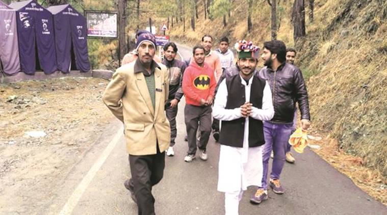 Jay Prakash Ghaluan, a Sarv Vikas Party candidate from Yamunotri, campaigning at a height of 6,500 ft. Being young, the 33-yr-old says, he can reach these areas. (Source: Express photo by Ashutosh Bhardwaj)