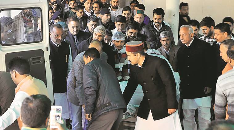 Vikramaditya Singh receives the body of Akansh Sen at PGIMER, Chandigarh, on Saturday. Sahil Walia