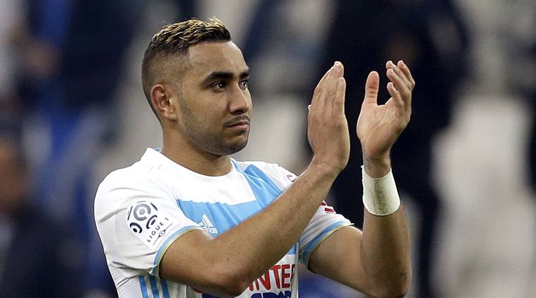 Marseille's Dimitri Payet applauds supporters after the League One soccer match between Marseille and Paris Saint-Germain, at the Velodrome Stadium, in Marseille, southern France, Sunday, Feb. 26, 2017. (AP Photo/Claude Paris)