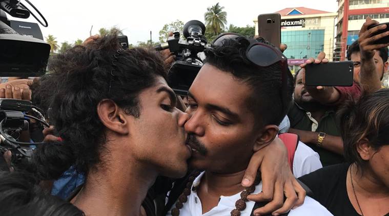 Love in the time of protests: Photo of a couple kissing near Sri