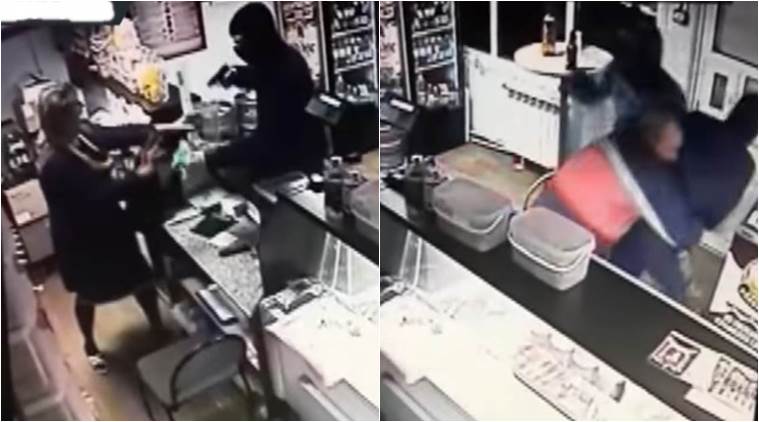 funny videos, viral videos, russian fights burglars in a abr, russians drinking, man fights robbers in a bar, man fights robbers, indian express, indian express news