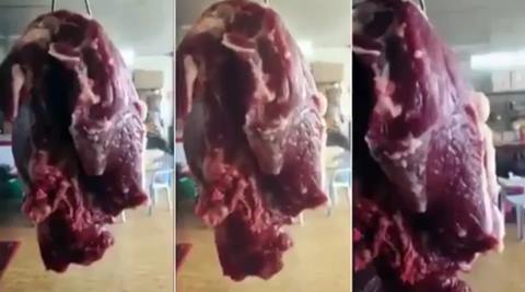 meat twitching china shop, china shop meat twitching on wires, viral videos, meat twitching in china butcher shop, indian express, indian express trending, indian express viral